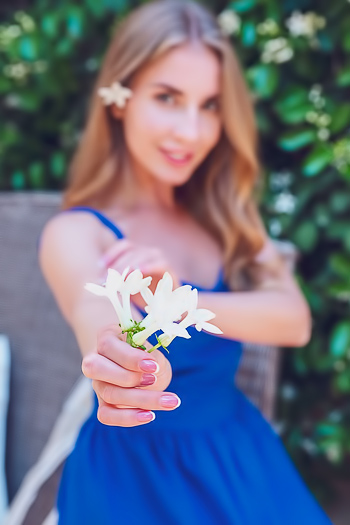 Bjorg Larson tantalizes with outdoor masturbation, lifting her dress to tease sun-kissed ass